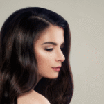 Woman with healthy, shiny hair after using onion hair oil